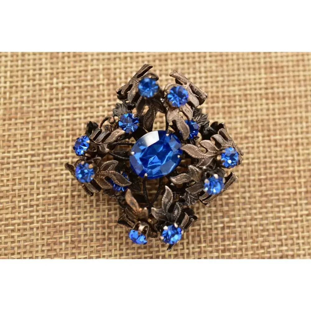 Vintage Austrian Blue Crystal Pin Brooch 3D Flower Gunmetal Tone 1960s BinBI